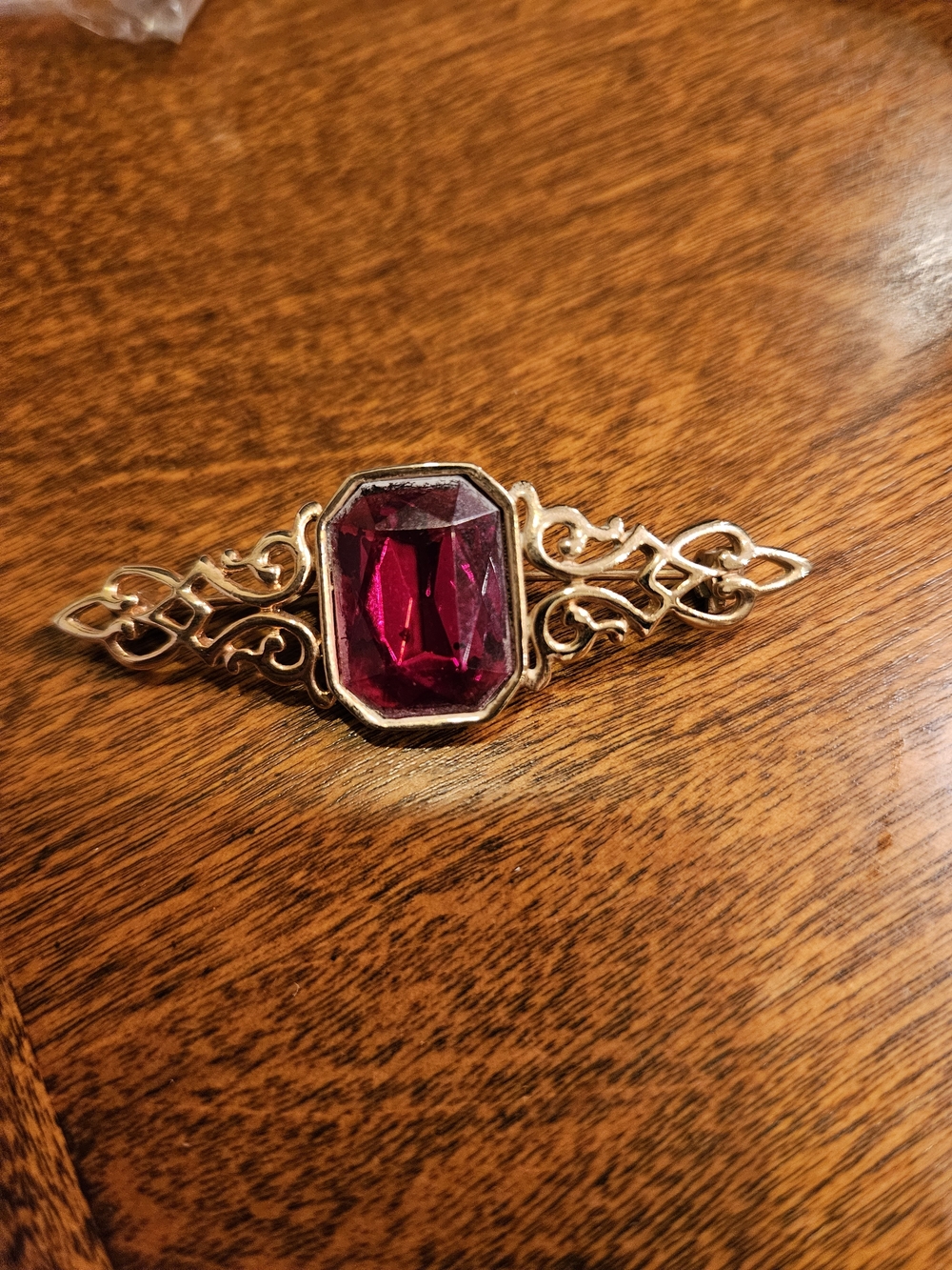 Park Lane Gold-Tone Filigree Brooch with Deep Ruby Red Stone